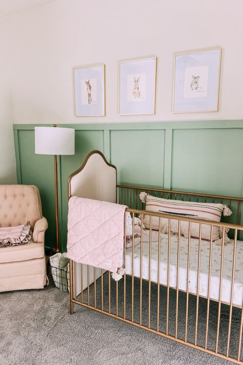 This delicate nursery is warm and inviting. The sage board and batten adds the perfect pop of color while keeping it sophisticated. Nursery Animal art is linked! Board And Batten Green Nursery, Soft Sage Nursery, Sage Green And Blush Pink Nursery, Sage Green Pink Nursery, Pink And Sage Green Nursery, Sage Pink Nursery, Pink And Green Baby Room, Light Green Nursery Girl, Green And Pink Nursery Girl