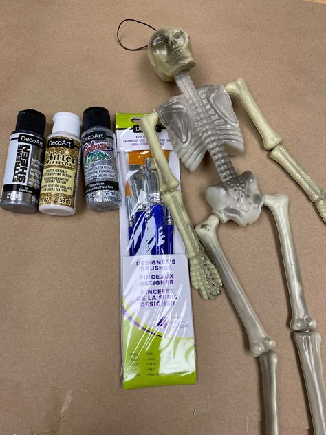 Dollar Tree Skeleton Makeover - The Shabby Tree Skeleton Tree Topper, How To Age Plastic Skeleton, Dollar Tree Wood Skeleton Crafts, Skeleton Crafts For Adults, Dollar Store Skeleton Crafts, Dollar Tree Skeleton Diy, Decorating Skeletons, How To Age A Plastic Skeleton, Plastic Skeleton Crafts