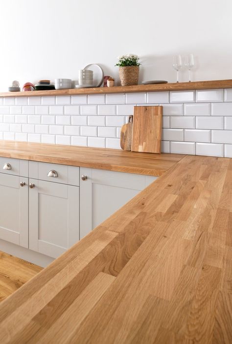 Our Solid Oak Kitchen Worktops will bring warmth to your kitchen! All of our Oak Worktops carry the natural beauty and diligence of the symbolic oak itself and are used either as Kitchen Worktops or as Table Tops. They are joined by Finger Joint mechanism, sanded and oiled with natural oil which showcases the beauty of the timber. Natural imperfections such as knots, grains and patterns are still present which add to the homey feeling of the Kitchen Worktops. Our oak worktops are made out of han White Shaker Kitchen Wooden Worktop, Grey Kitchen Cupboards Wooden Worktop, Oak And Gold Kitchen, Oak And Taupe Kitchen, Wood Worktops Kitchen, Kitchen Design Wooden Counter Tops, Top Table Kitchen, Sage Kitchen Wooden Worktop, Oak Worktop