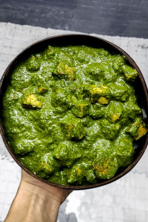 Palak Tofu is a delicious Indian curry with spinach and tofu. It is protein packed and full of iron. Enjoy this healthy curry with vegan Indian bread or basmati rice. A lot of Indian recipes are already vegan, or are super easy to veganize. Sometimes you will see that cottage cheese (paneer) is used in recipes. However, you can simply replace the cottage cheese with tofu! #indiancurry #veganindianfood Tofu Palak, Tofu Spinach Curry, Indian Veggie Curry, Healthy Tofu Dinner, Indian Food Vegan, Indian Vegetarian Food, Vegan Indian Food Recipes, Medicinal Food Recipes, Indian Food Healthy