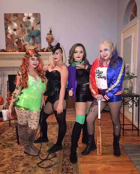 Gotham city costume. Poison ivy, cat woman, the joker, and Harley Quinn take on the world. Group costumes Dc Villain Costumes, Hero And Villian Costume, Joker Group Costume, Cat Woman And Poison Ivy Costumes, Trio Halloween Costumes Villains, Trio Halloween Costumes Joker, Héros And Villians Costume Ideas, Dc Group Costumes, Cat Woman Harley Quinn Poison Ivy Costume