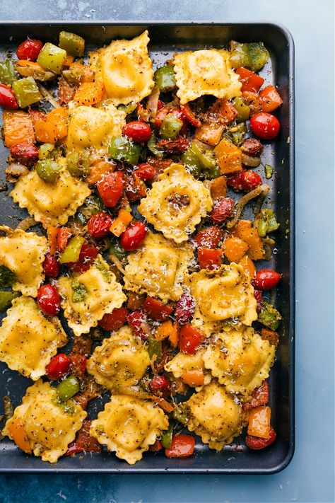 Pesto Ravioli (With Veggies!) - Chelsea's Messy Apron Pesto Pasta Dishes, Pesto Ravioli, Chelsea's Messy Apron, Seasoned Veggies, Caprese Pasta, Sheet Pan Dinners Recipes, Ravioli Recipe, Green Recipes, Recipes Cookies