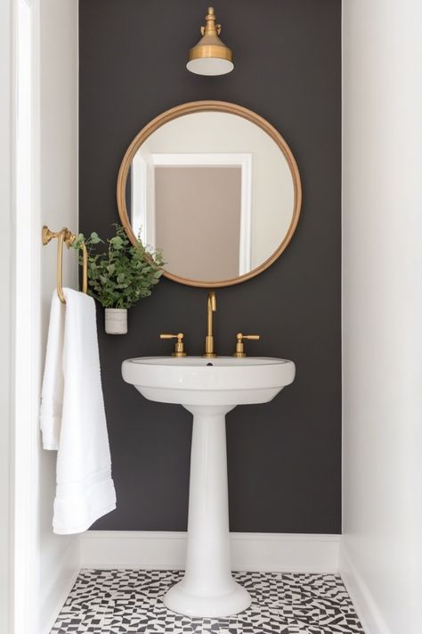 Design the perfect small moody bathroom space with these decor ideas. Colonial House Interior Design Bathroom, Small Bathroom With Dark Walls, Small Half Bath Paint Ideas, Gray Cabinet Bathroom Ideas, Small Powder Room Decorating Ideas, Small Powder Room With Pedestal Sink, Power Bathroom Ideas, Vintage Style Bathroom Ideas, Minimalist Powder Room Ideas