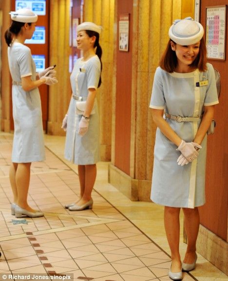 Uniformed lift attendants in a Tokyo department store Store Uniform, Housekeeping Uniform, Staff Uniforms, Women's Uniforms, Police Uniforms, Work Uniforms, Department Store, Style Guides, Tops Designs