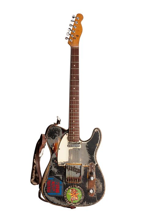 This guitar was Joe Strummer’s principal instrument. He played it in the studio while with the Clash and throughout his solo career. After he acquired the guitar in the early 1970s, Strummer took the guitar to an auto-body shop, where he had it spray painted with gray primer. (Collection of Lucinda Strummer) Punk Rock Guitar, 90s Guitar, 80s Guitar, Punk Guitar, Painted Guitar, Old Guitar, Famous Guitars, Joe Strummer, Guitar Obsession