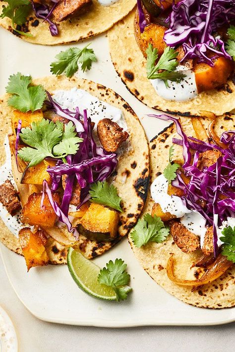 This quick and easy 35-minute acorn squash and chorizo taco recipe incorporates acorn squash, red onions, chorizo, sour cream, lime, cilantro, corn tortillas, red cabbage and hot sauce to create the ultimate comfort food meets fall recipe. Whether you’re looking to eat this acorn squash recipe as a quick and easy weeknight dinner or a fall lunch, it’s a great choice for a comfort food recipe. #tacorecipes #acornsquash #squashrecipes #fallrecipes #weeknightdinners #comfortfood Squash Tacos, Healthy Taco Recipes, Chorizo Tacos, Healthy Taco, Grilled Chicken Tacos, Spicy Shrimp Tacos, Cabbage And Sausage, Healthy Tacos, Acorn Squash