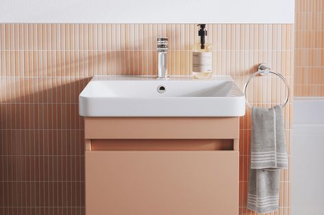 Peach Bathroom Accessories, Peach Bathroom Vanity, Terracotta Bathroom Cabinets, Terracotta Bathroom Ideas, Terracotta Bathroom, Gold Painted Walls, Pastel Bathroom, Peach Bathroom, Bathroom Sink Units