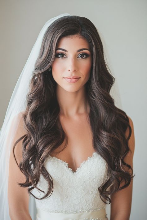 80+ Gorgeous Hairstyles for Brides with Long Hair | Matched Hearts Long Soft Curls Wedding, Hair Down Cathedral Veil, Wedding Hair Long Hair Down, Bridal Hair Down Brunette Loose Curls, Big Curls For Long Hair Wedding, Bride Hair Down Waves, Wedding Hairpiece Hair Down, Hollywood Curls With Veil, Bride Hairstyles For Round Face