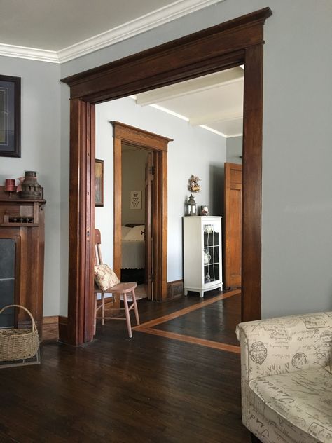 Grey Wall Wood Trim, Exposed Wood Trim, Wood Around Windows Interior, Dark Wood Moldings And Trim, Dark Wood Trim Kitchen, Gray Walls With Wood Trim, Natural Wood Trim Interior, Wood Baseboards And Trim, Stained Trim Interior