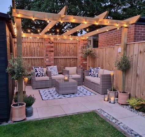 You can also tone things down a bit and opt for a more refined design like this. It features sleeker furniture, lighter colors, and a minimalist aesthetic. Image credit: INSTAGRAM @OURVICTORIANHOME_66 Fenced In Pergola, Backyard Vision Board, Garden Patio With Pergola, Garden Ideas Pergola, Pergola In Yard, Garden Design With Pergola, Patio With Fairy Lights, Back Garden Design Ideas, Pergola Next To House