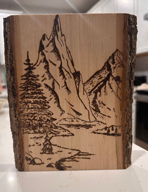 Wood burned mountain scene on Basswood Wood Burning Mountain Range, Wood Burn Mountains, Pyrography Art Woodburning, Wood Burning Beginner, Wood Burn Art, Mountain Wood Burning, Woodburning Crafts, Wood Burning Projects, Burning Mountain