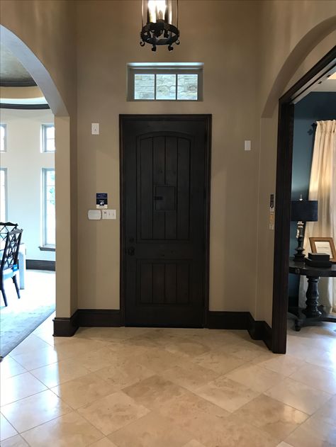 Tan Walls Dark Trim, Home Color Schemes Interior With Dark Wood, Black Trim Tan Walls, Beige Wall Black Trim, Light Trim Dark Walls, Taupe Walls Black Trim, Dark Doors With Dark Trim, Dark Gray Walls With Black Trim, Black And Brown Walls