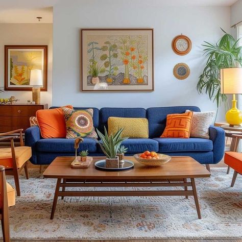 Mid Century Pillows Couch, Bold Mid Century Modern Living Room, Vibrant Living Room Ideas Modern, Blue Couch Grey Walls Living Room, Modern Eclectic Cottage, Mid Century Modern Living Room Blue Sofa, Living Room Colorful Ideas, Mid Century Modern Blue Living Room, Old Meets New Interior Design