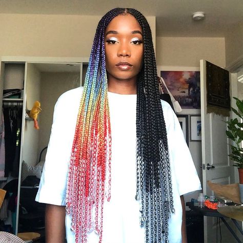 Fun with colors 😍 Do you love the funky twist that @cherdericka created with these box braids? 🌈 Which half of the style is your favorite? Melanin Hairstyles, Colorful Braids, Ombre Box Braids, Triangle Braids, Braids With Shaved Sides, Braid Accessories, Blonde Box Braids, Pretty Braids, Bold Hair Color