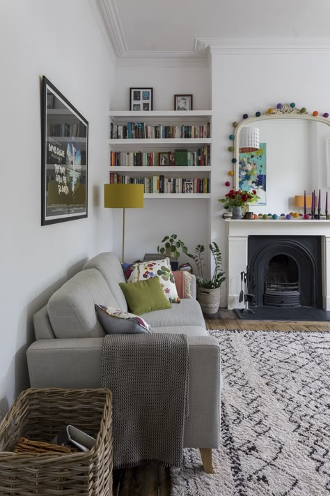 Interior Design by Imperfect Interiors at this Victorian Villa in London. A palette of contemporary Farrow & Ball paint colours mixed with traditional period details- white walls, a mustard yellow floor lamp, Moroccan rug & cushions made from Josef Frank Svenst Tenn fabric on the sofa in the living room. Photo by Chris Snook Victorian Villa, Ruang Tv, Victorian Living Room, Yellow Living Room, Up House, Traditional Living Room, Living Room Diy, Living Room Grey, New Living Room