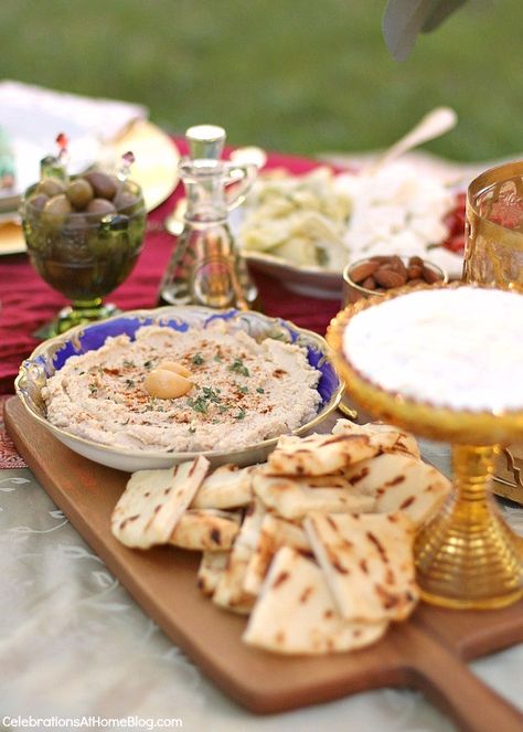 Serve mezze platters  to accompany the cocktails. Lots of decor, food, & drink ideas from this Moroccan inspired party. Moroccan Mezze Platter, Middle Eastern Party Decorations, Casablanca Dinner Party, Middle Eastern Dinner Party Decor, Arabian Nights Food Ideas, Home Wedding Food Ideas, Arabian Nights Party Food, Moroccan Birthday Party Ideas, Moroccan Themed Party