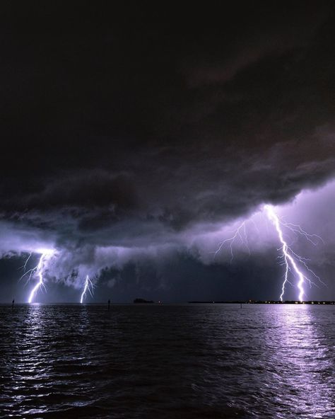 "An ominous lightning storm view from Holmes Beach, FL this past Wednesday night, as two thunderstorms converged over the Anna Maria Sound… Storms End, Beach Storm, Fantasy Country, Lightning Sky, Storm Wallpaper, Lighting Storms, Ocean Storm, Storm Chaser, Sea Storm