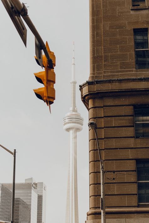 CN tower and Front street view in cozy winter morning, Downtown Toronto. Toronto Street Photography, Delta Art, Toronto Street, Vintage Toronto, Front Street, Toronto Fashion, Winter Morning, Downtown Toronto, Cozy Winter