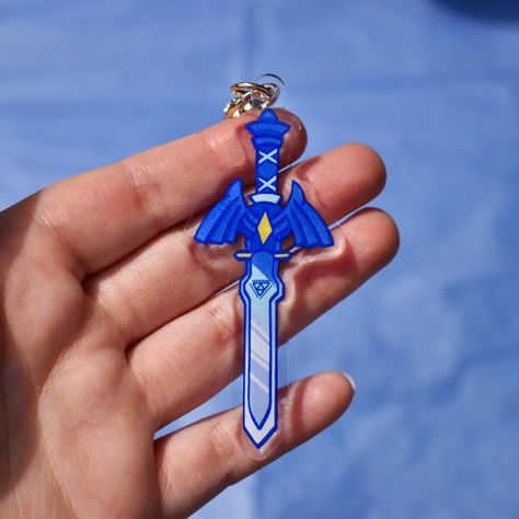 Mastersword acrylic keychain, zelda, botw, totk, keychain zelda, korok, hyrule herb, gaming, link, mastershield ,shield Zelda BOTW large keychains! Material : Acrylic Size : 3 inches tall (not including chain) The protectice film has already been peeled away so the keychain is ready for use! Delivery takes up to 7 business days to arrive. Please choose your prefered keychain from the menu. If you want a random pick, you can leave a comment before making the transaction! Zelda Keychain, Zelda Korok, Zelda Gifts, Hylian Shield, Zelda Botw, Zelda Breath Of The Wild, Zelda Breath, Acrylic Keychain, Breath Of The Wild