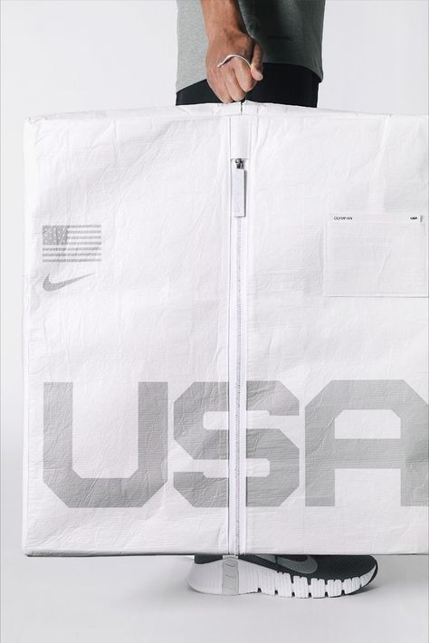 When USA Olympians stood atop the medals stand in Tokyo, they were outfitted in a sustainable head-to-toe look developed by Nike. 

Working alongside Nike’s apparel team, we created an equally sustainable packaging system using Nike Grind material, part of the company’s ongoing efforts to repurpose old materials into new products. Nike Packaging, Clothes Packaging Design, Sports Packaging, Apparel Packaging, Nike Gifts, Tshirt Packaging, Pr Kit, Nike Bags, Clothing Packaging