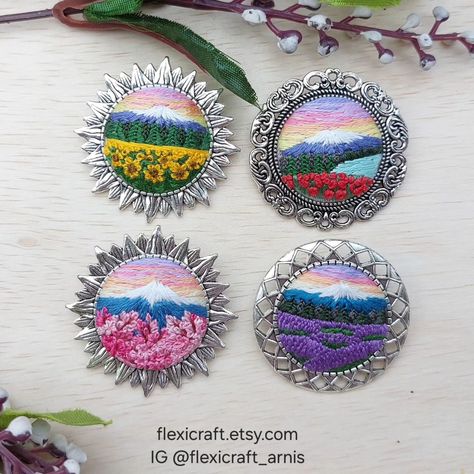 They now become four!! ☺️❤️ Hand embroidered landscape brooches. Live in my Etsy shop: https://flexicraft.etsy.com/listing/1702839898 #embroidery #miniature #miniembroidery #embroideredbrooch Miniature Embroidery Tutorial, Miniature Embroidery Ideas, Miniature Embroidery Patterns Free, Embroidery Mini Flowers, Embroidery Landscape, Miniature Needlepoint, Key Change, Miniature Embroidery, Handmade Embroidery Designs