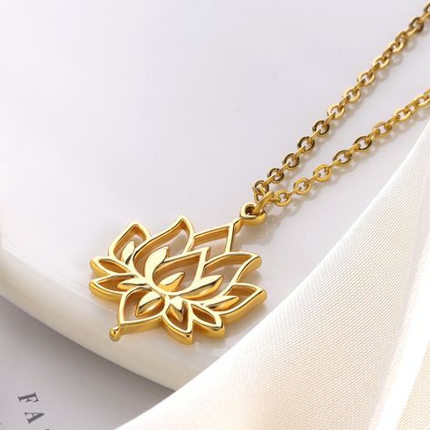 The Lotus Flower Pendant Necklace is regarded in many different cultures, especially in eastern religions, as a symbol of purity, enlightenment, self-regeneration and rebirth. Its characteristics are a perfect analogy for the human condition: even when its roots are in the dirtiest waters, the Lotus produces the most beautiful flower. It's geometric design is very pleasing to the eye and will capture the attention of those around you. Metals Type: CopperGender: WomenNecklace Type: Pendant Neckla Chakra Necklace Yoga Jewelry, Lotus Shape, Lotus Flower Pendant, Couple Pendant, Flower Necklace Gold, Yoga Chakra, Lotus Flower Necklace, Lotus Pendant, Gold Lotus