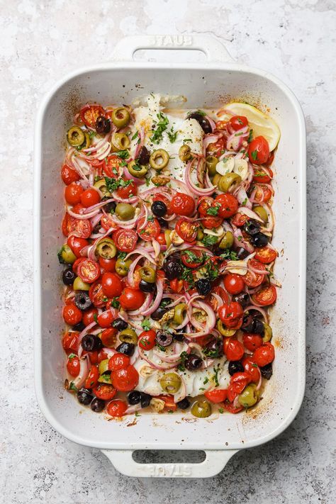 This Mediterranean Baked Cod recipe takes just 10 minutes to prep and features a robustly flavored tomato and olive relish with onions, garlic, and red wine vinegar. It doesn't get easier or more delicious when you want dinner on the table quickly. Serve with your favorite roasted or blistered vegetables for a healthy weeknight dinner. GF, DF #wellseasonedstudio #bakedcod #bakedwhitefish #cod #mediterranean Mediterranean Baked Cod, How To Cook Cod, Bake Fish, Fish Meals, Baked Cod Recipes, Cod Recipe, Flavorful Dinner, Healthy Weeknight Dinners, Olive Relish