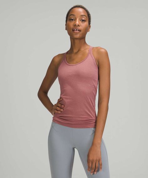 Release Date: 7/2021. Original Price: $58. Color: Spiced Chai. Embrace your movement. This soft tank is powered by seamless construction so you can move freely through your practice, training, and beyond.Fabric is sweat-wicking and four-way stretchFeaturesDesigned for: YogaReduced chafing : Seamless construction reduces chafing Light support: Intended to provide light support for a B/C cupBuilt-in bra: Built-in bra gives you added support and coverageCoverage: Pockets for optional, removable cu Lululemon Ebb To Street Tank, Ebb To Street Tank, Spiced Chai, Lululemon Ebb To Street, Scoop Neck Bodysuit, Technical Clothing, Yoga Tank Tops, Tank Top Bras, Top Light