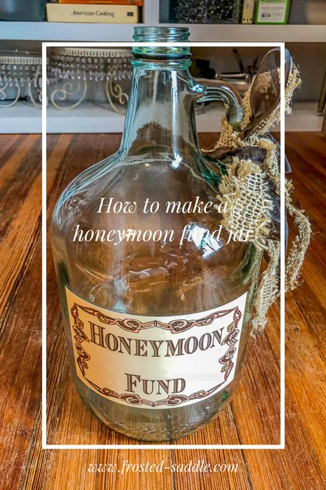 Fun way to start saving for your honeymoon.  Learn how to make a honeymoon fund jar.  #DIYWedding #WeddingBudget Wedding Money Tree Ideas Honeymoon Fund, Honeymoon Fund Jar, Couples Shower Themes, Minimalist Wedding Decor, Lights Wedding Decor, Simple Wedding Decorations, Honeymoon Fund, Luxury Wedding Decor, Modern Wedding Decor