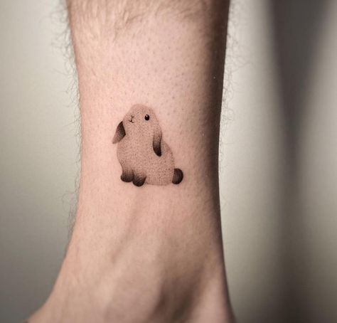 Bunny Paw Print Tattoo, Bunny Paws Drawing, Fluffy Bunny Tattoo, Pet Bunny Tattoo, Bunny Paw Tattoo, Rabbit Tattoo Aesthetic, Black Rabbit Tattoo, Minimal Rabbit Tattoo, Aesthetic Rabbit Tattoo