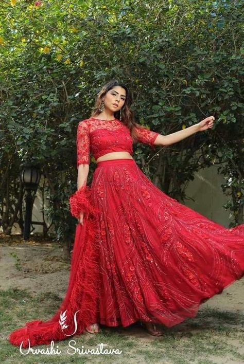 The Red Lehenga is 2021's most popular Bridal look. Brides are going back to traditional roots and showing major love to Red Lehenga. Here are some latest designs for you to gush over! Reception Frocks, Sabyasachi Lehenga Cost, Red Bridal Lehenga, Bridal Lehenga Designs, Indian Designs, Sabyasachi Lehenga, Indian Outfits Lehenga, Wedding Lehenga Designs, Lehnga Dress