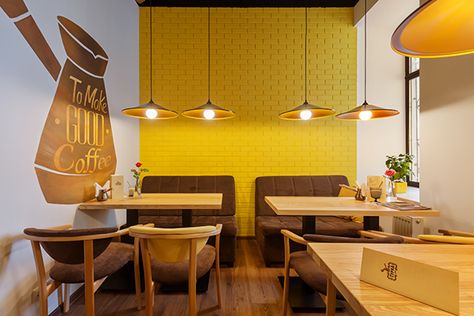 Yellow Cafe Interior Design, Yellow Cafe Aesthetic, Yellow Cafe Interior, Uncle Fluffy, Yellow Coffee Shop, Yellow Restaurant, Cozy Cafe Interior, Coffee Cafe Interior, Small Restaurant Design