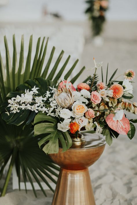 Glamorous Tropical Wedding Flowers on copper vase. Coral florals beach wedding ceremony decor - Amy Lynn Photography Beach Wedding Locations, Beach Wedding Decorations Reception, Beach Wedding Centerpieces, Beach Theme Wedding Invitations, Tropical Wedding Flowers, Beach Wedding Flowers, Themed Wedding Invitations, Wedding Beach Ceremony, Beach Wedding Decorations