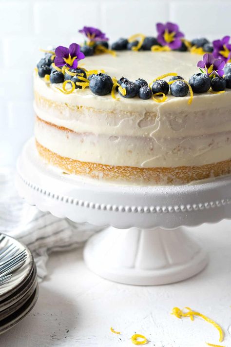 Lemon Blueberry Cake - El Mundo Eats Blueberry Orange Cake, Lemon Blueberry Wedding Cake, Best Lemon Blueberry Cake, Lemon Yogurt Cake Recipe, Blueberry Lemon Cake Recipe, Blueberry Wedding, Lemon Yogurt Cake, Lemon Blueberry Cake, Engagement Party Cake