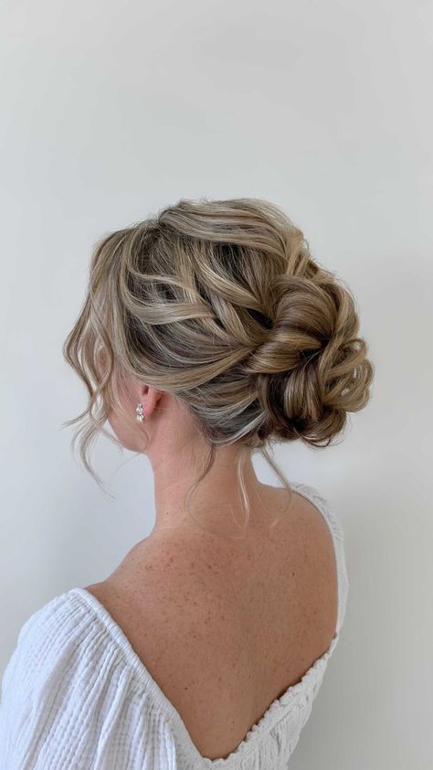 Low Messy Bun Wedding Hair Loose Curls, Debs Hair Updo, Prom Updos Bun, Deb Hairstyles Bun, Low Messy Wedding Bun, Low Updo Prom Hair, Prom Hair Bun Low, Hair For Bridesmaids Updos, Wedding Updos For Medium Hair Front View