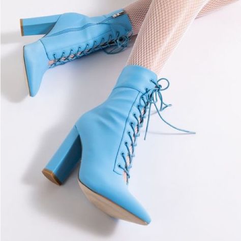 Azalea Wang Chunky Heel Bootie In Blue Is An Exclusive Pair Of Pointed Toe Ankle Booties Featuring A Nylon-Based Upper, Tonal D-Ring Eyelets, A Lace-Up Vamp, And Flared Block Heel. Pointed Toe - Block Heel - Lace Up Vamp 5.75” Shaft Height 4.75” Heel Height Pointed Toe Jean Detail Closet Includes: Pink Boots, Red Boots , Yellow Boots, Silver Boots, Gold Boots, Black Boots, Brown Boots, White Boots, Orange Boots, Tan Boots, Rhinestones Boots, Crystal Boots, Cowboy Boots, Platform Boots, Combat Bo Rhinestones Boots, Orange Boots, Gold Boots, Silver Boots, Yellow Boots, Leather Boots Heels, Azalea Wang, Pink Boots, Blue Boots