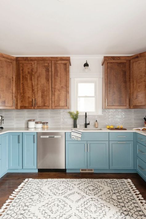 Tour this vibrant and playful kitchen makeover we did. We did a two-tone kitchen cabinets - blue painted lower kitchen cabinets with wood upper cabinets. For the countertops, we went with a timeless gray quartz countertop. See the whole kitchen remodel at haywoodmade.com Painted Lower Kitchen Cabinets, Wood Upper Cabinets, Lower Kitchen Cabinets, Pattern Backsplash, Cabinets Gray, Best Kitchen Colors, Two Tone Kitchen Cabinets, Lower Cabinets, Two Tone Cabinets