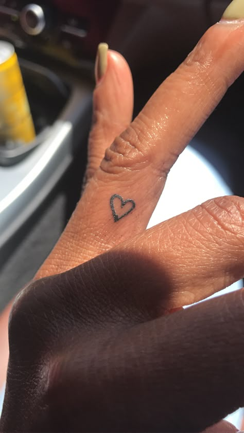 Heart tattoo on left ring finger. Simple but fashionable Cute Finger Tattoos For Women Simple, Finger Tats For Women Simple, Small Finger Tattoos For Women Simple, Tattoo Ideas Ring Finger, Heart Tattoo On Pinky, Finger Letter Tattoo, Finger Side Tattoo, Pinky Finger Tattoos For Women, Small Heart Tattoo On Hand