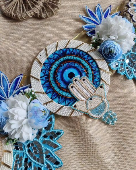 Super gorgeous Evil eye theme Bandhanwar/Toran in Blue theme with pearl and mirror work to add extra classiness to your home entrance! Because first impressions always stay!! #toran #bandhanwar #bandarwal #evileyehanging #evileyetoran #diwalicollection #diwalidecor #homedecor Evil Eye Bandarwal, Welcome Home Decorations, Home Entrance, Blue Theme, Blue Evil Eye, Diwali Decorations, Mirror Work, First Impressions, House Entrance