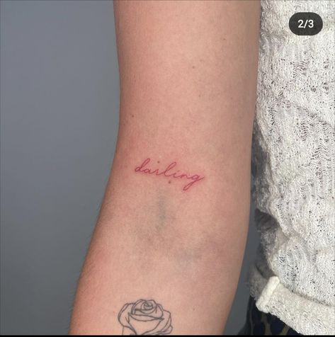 Pink Ink Tattoo Writing, Red Written Tattoo, Red Name Tattoos For Women, Darling Tattoo Words Fonts, Red Tattoo Words, Darling Tattoo Words, Red Cursive Tattoo, Red Ink Word Tattoo, Darlin Tattoo