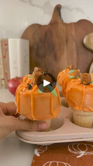 9.2K views · 158 reactions | Let’s make the Funfetti Pumpkin Upside Down Cupcake Cones!

Ingredients: Funfetti Halloween Cake Mix, ice cream cones, Funfetti Halloween frosting, HARIBO sour streamers, Werther’s Soft Caramels, piping bag and tip

1. Preheat the oven to 350 degrees. Make the batter using the box instructions. Grease the pan and pour in the funfetti batter into the cupcake tins and then top with cones.

2. Bake for 17-22 minutes.

4. Let them cool off then frost with Halloween funfetti frosting, add a caramel for the stem, pipe the lines for the pumpkin, and cut leaves with green HARIBO sour steamers and add sprinkles on top! | Michelle Home decor  | Michelle Home decor  · Original audio Freezing Cupcakes, Halloween Funfetti, Fall Cooking Recipes, Funfetti Frosting, Soft Caramels, Funfetti Cupcakes, Cupcake Cones, Halloween Food Treats, Cupcake Tins