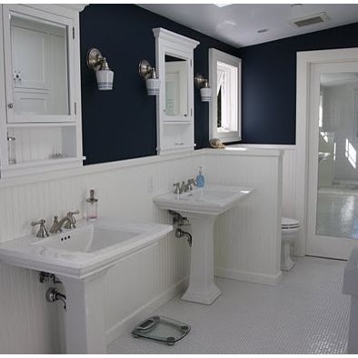 navy blue half wall, beadboard, color scheme...very similar to what I can picture in my head. Vertical Shiplap, Grey And White Bathroom, Wainscoting Bedroom, Beadboard Bathroom, Navy Bathroom, Wainscoting Bathroom, Dining Room Wainscoting, Wainscoting Styles, White Wainscoting