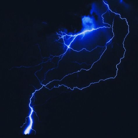 An image of lightning striking that is tinted blue. Blue Superhero Aesthetic, Blue Lightning Aesthetic, Superspeed Aesthetic, Lightning Powers Aesthetic, Blue Dragon Aesthetic, Lightning Veins, Electric Blue Aesthetic, Blue And Black Aesthetic, Thunder Aesthetic