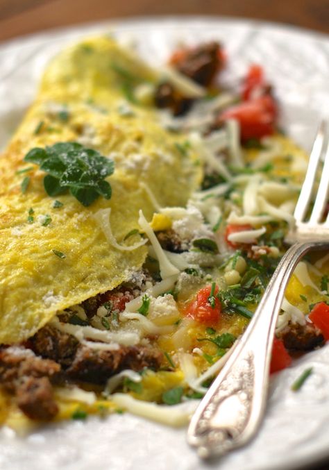 Italian Trattoria Omelette with Sausage, Mushroom, Tomato, Mozzarella, and Fresh Garlic Italian Omelette, Italian Trattoria, Mushroom Tomato, Sausage Mushroom, My Protein, Omelette Recipe, Tomato Mozzarella, Breakfast Choices, Cuisine Recipes