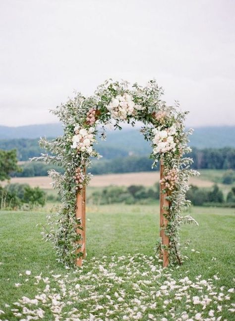 Create a DIY wedding arch for your big day. These stunning decor ideas are sure to make your special day spectacular. A beautiful wedding arch can anchor an outdoor ceremony and serve as a photo backdrop. Read on for our favorite DIY wedding arches you can use to get inspired and create elegant structures that align with your own personal style.    #weddingideas #weddingsdecor #wedding Wedding Alters, Spring Wedding Decorations, Wedding Arches, Wedding Arbour, Wedding Altars, Spring Wedding Inspiration, Salou, Outdoor Wedding Ceremony, Woodland Wedding