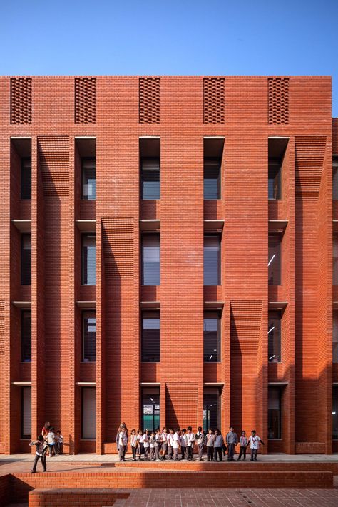 Aga Khan Academy Dhaka wraps around courtyards in Bangladesh Aga Khan, Brick Decor, Small Courtyards, Khan Academy, Solar Shades, Brick Architecture, Layout Architecture, Brick Facade, Outdoor Learning