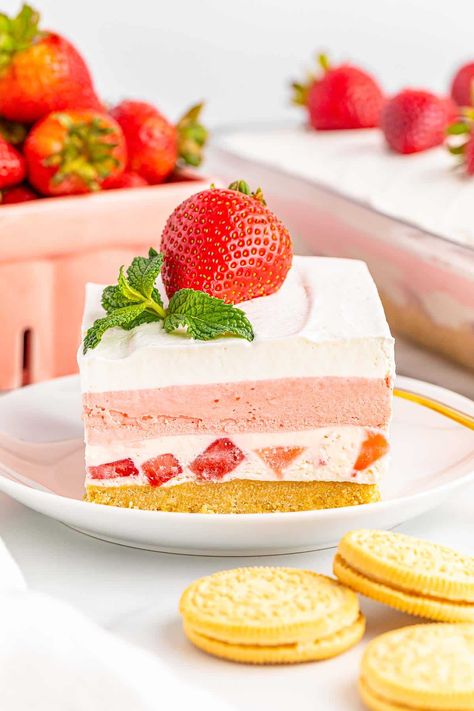 This Strawberry Delight is a deliciously light dessert with layers of buttery cookie crust, sweet cheesecake, and a creamy strawberry gelatin. It's an easy no-bake dessert with fresh strawberries for the ultimate strawberry dessert that is luscious down to the last crumbs on the plate. No Bake Strawberry Shortcake, Strawberry Shortcake Cheesecake Recipe, Birthday Desert, Cheesecake Strawberry, Strawberry Shortcake Cheesecake, Strawberry Cheesecake Recipe, Strawberry Shortcake Birthday, Oatmeal Cream Pies, Strawberry Delight