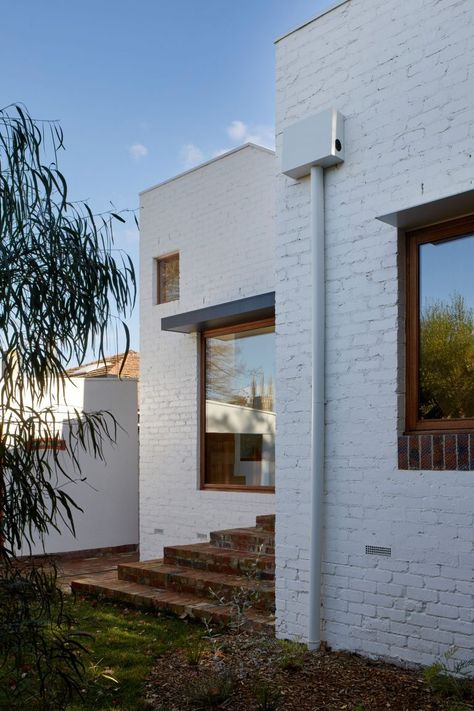 A renovation and extension to an interwar cottage, Escher House takes its name from the inventive, often surreal play on space conceived by artist M.C Escher. Inbetween Architecture brings a contemporary relevance to this significant period home, celebrating the existing details and bringing together the old with a new elevated refinement. #architect #homerenovation #moodboard #homegoals #architecturehunter #bathroomideas #houseandgarden #amazinglandscape #newbuild 1930s Cottage, Home Extension, Period Home, Modern Extension, Brick Home, The Local Project, Australian Architecture, Casa Exterior, Black Windows