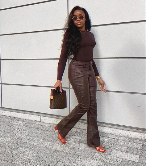 Full Brown Outfit, Trending Color Aesthetic, Chocolate Brown Outfit Black Women, Black Women In Brown Outfits, Shades Of Brown Outfits For Black Women, Brown Leather Pants Outfit Winter, Brown Fits Black Women, Brown Leather Outfits For Black Women, Sleek Brown Leather Pants For Night Out