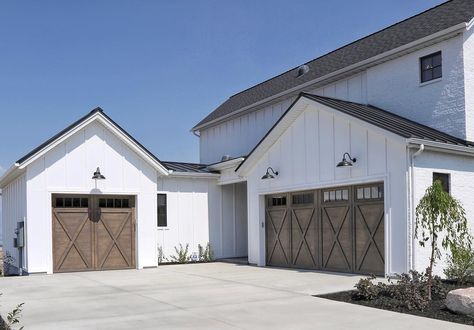 329 Likes, 7 Comments - Cyndy Aldred (@thecreativityexchange) on Instagram: “Last week I shared a close up of this gorgeous garage that saw during the #saltlakeparadeofhomes…” Wooden Garage Doors, Modern Garage Doors, Farmhouse Garage, Garage Door Styles, Farmhouse Exterior Design, Garage Door Design, Modern Garage, Modern Farmhouse Design, Modern Farmhouse Exterior